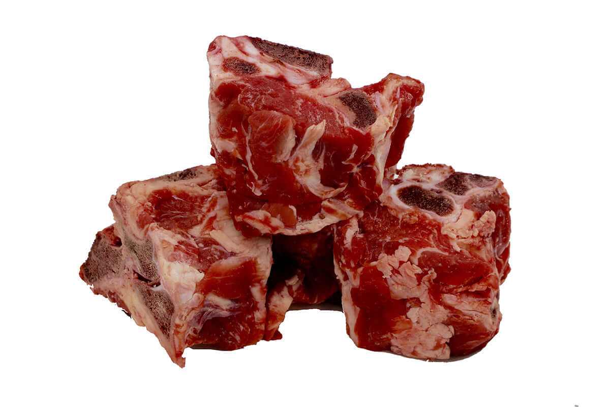 Raw beef back bones stacked for dog treats and dental health, 1kg pack