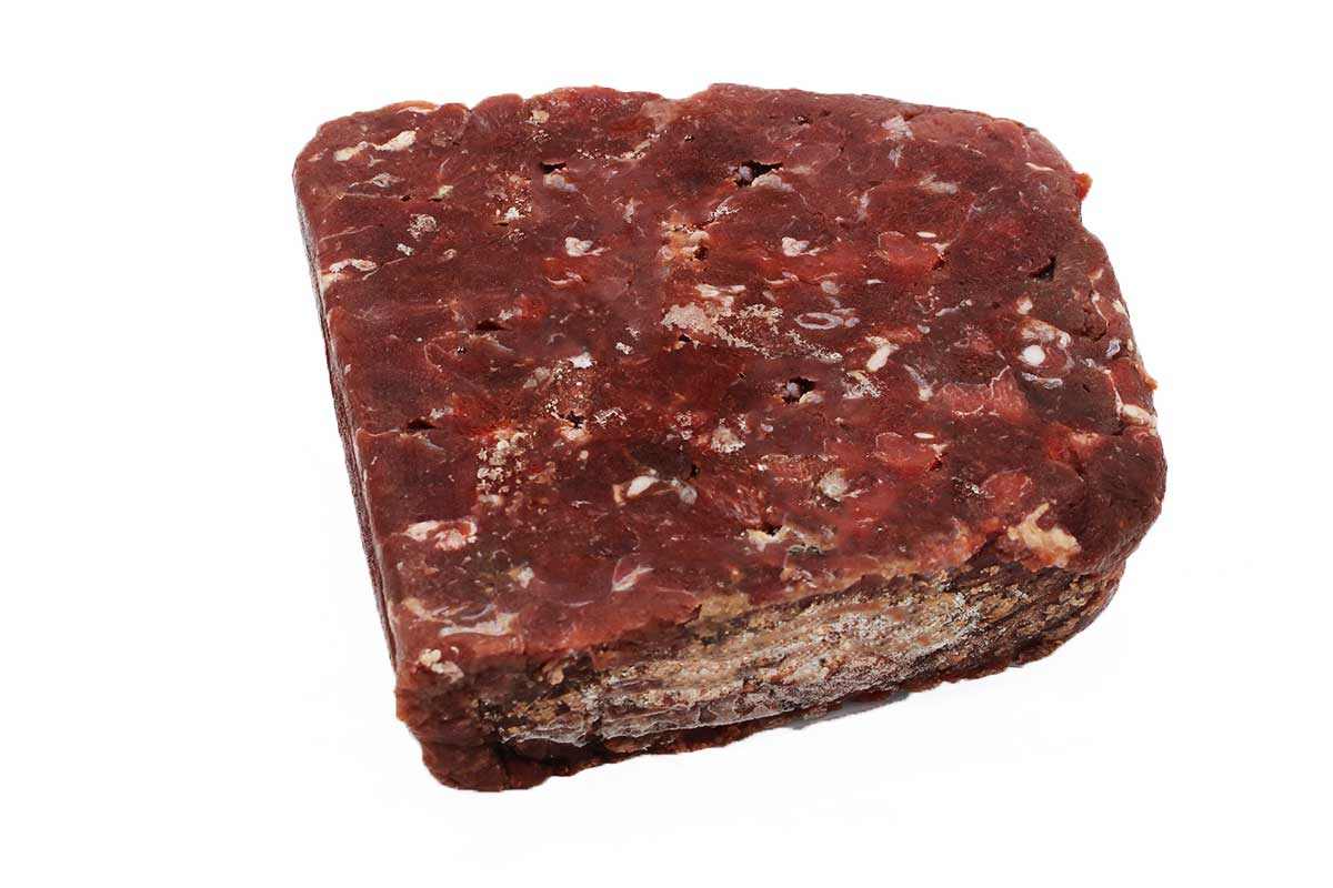 Frozen block of high-protein, low-fat roo mince meat isolated on white background