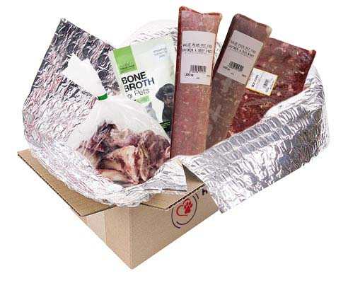Thermal insulation packaging with frozen meat and bone broth inside a delivery box