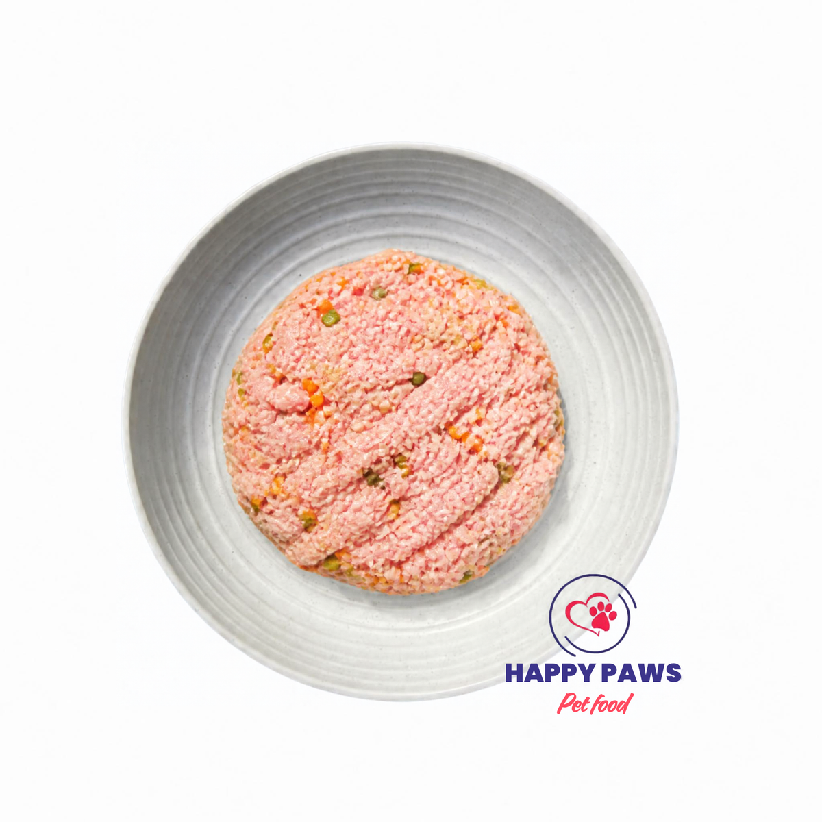 Chicken & Veggie Mince, pink raw ground meat with green and orange vegetable flecks shaped into a round mound